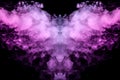 Abstract mystical bat silhouette straightened wings from streams of colorful smoke evaporating from a vape illuminated by neon Royalty Free Stock Photo