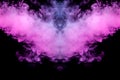 Abstract mystical bat silhouette straightened wings from streams of colorful smoke evaporating from a vape illuminated by neon Royalty Free Stock Photo