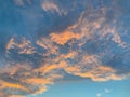 Abstract nature background. Dramatic blue sky with orange colorful sunset clouds in twilight time Royalty Free Stock Photo