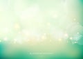 Abstract nature glowing sun light flare and bokeh with green turquoise color smooth blurred background Royalty Free Stock Photo