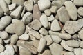 Abstract nature sea stones background. Beige rounded stones texture. Stone background. Royalty Free Stock Photo