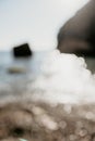 Abstract nature summer ocean sunset sea background. Small waves on water surface in motion blur with bokeh lights from Royalty Free Stock Photo