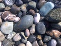 Abstract nautical background with pebbles, top view.