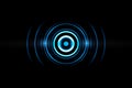 Abstract neon light blue circle effect with sound waves oscillating on black background Royalty Free Stock Photo