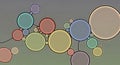 Abstract network of interconnected colorful circles of varying sizes on a subtle gray background Royalty Free Stock Photo