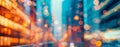 Abstract night lights, view of a modern futuristic cityscape. Defocused image of an urban street between tall buildings, towers Royalty Free Stock Photo