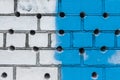 Abstract old design of dirty brick white wall with round holes pattern and blue paint texture background Royalty Free Stock Photo