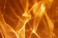 Abstract orange fire like background with shadows and sparkles. Royalty Free Stock Photo