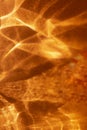 Abstract orangefire like background with shadows and sparkles. Royalty Free Stock Photo