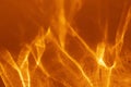 Abstract orange fire like background with shadows and sparkles. Royalty Free Stock Photo