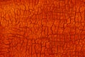 Abstract orange grunge background. Burbed wood texture with cracks Royalty Free Stock Photo