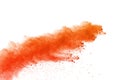 Abstract of orange powder explosion on white background. Orange Royalty Free Stock Photo