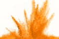 Abstract orange powder splatted background. Colorful powder explosion on white background. Colored cloud. Colorful dust explode. P Royalty Free Stock Photo