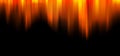 Abstract orange and yellow gradient stripes motion blur on black background texture