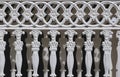Abstract ornament and decorative pattern of vintage white cast iron sliding fence gate in Roman style