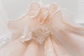 Abstract overhang wedding dress. unusual upward angle view.