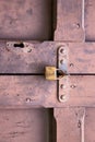abstract padlock rusty brass brown closed wood door crenna gal