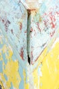 Abstract paint background with random patterns of layers of aged and weathered paint on a wood surface