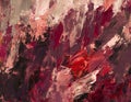 Abstract painted canvas in shades of red oil paint with a dark bottom palette knife texture background