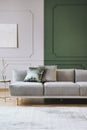 Abstract painting on empty wall of classy living room interior Royalty Free Stock Photo