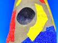 Abstract painting of Joan Miro artist. Detail of a monument. Blue, red, yellow and black colors.