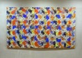 Abstract painting by unidentified artist on display in corridor around lecture rooms on the lower level of McDermott Plaza