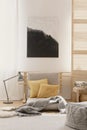 Abstract painting on the white wall of japanese inspired bedroom design