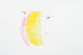 Abstract painting with yellow and pink watercolor strokes