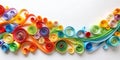 Abstract panel made of colored paper scrolled into curls and rolls. Quilling banner on a white background with copy space.