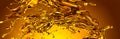 An abstract panoramic image of a gold paint splash on a gold background