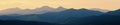 Abstract panoramic mountain landscape, tonal perspective at suns Royalty Free Stock Photo