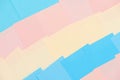Abstract pastel background from colored note paper. Beautiful delicate background pink, yellow, blue Royalty Free Stock Photo