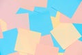 Abstract pastel background from colored note paper. Beautiful delicate background pink, yellow, blue Royalty Free Stock Photo