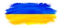 Abstract patriotic brushstroke paint brush splash in the colors of the flag of Ukraine, isolated on aquarelle paper background