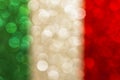 Abstract patriotic flag with bokeh lights, green white and red glitter sparkle defocused background Royalty Free Stock Photo