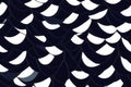 Abstract pattern of black and white curved shapes