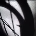Abstract patterns and shadows from flap space and natural light. Is a sunny shadow that stretches along the flap next to the house Royalty Free Stock Photo