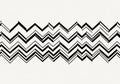 Abstract pattern of black zigzag lines on a white background. The Royalty Free Stock Photo