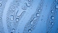 Abstract pattern of blue water droplets and condensation on a smooth surface Royalty Free Stock Photo