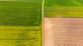 Abstract pattern in farmland fields at spring, aerial view, drone photo