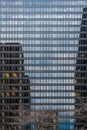 Abstract pattern of office windows and reflections in a modern skyscraper Royalty Free Stock Photo