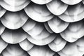 Abstract pattern of overlapping semi-circular metallic scales