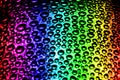 abstract pattern of pure water drop above surface of colorful rainbow color background Royalty Free Stock Photo