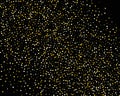 Abstract pattern of random falling gold dots on black background. Holiday abstract texture. Christmas Gold Glitter background. Royalty Free Stock Photo