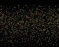 Abstract pattern of random falling gold dots on black background. Holiday abstract texture. Christmas Gold Glitter background. Royalty Free Stock Photo