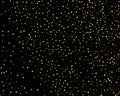 Abstract pattern of random falling gold dots on black background. Holiday abstract texture. Christmas Gold Glitter background. Royalty Free Stock Photo