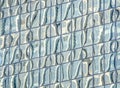 Abstract pattern reflects on glass window of tall building. Royalty Free Stock Photo