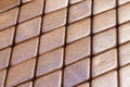 Abstract pattern of rhombus brown bamboo wood pieces Royalty Free Stock Photo