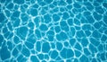 Abstract pattern of sunlight reflected on blue swimming pool water surface Royalty Free Stock Photo