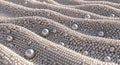 Abstract pattern of tiny spheres and larger orbs in undulating waves Royalty Free Stock Photo